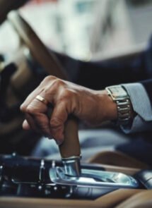 Closeup hand shifting vehicle