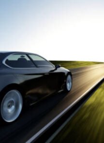 Black vehicle on open road