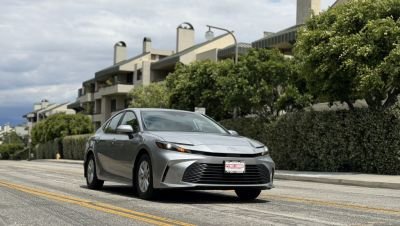 Toyota Camry rental car parked on street