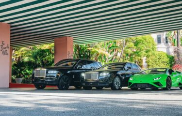 https specials images.forbesimg.com imageserve 60f326eca5312b1fe4118145 Rolls Royces and a Ferrari lined up outside the Beverly Hills Hotel 960x0